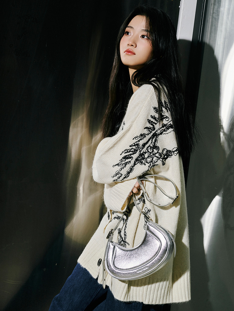 Women’s Petra curved shoulder bag in silver, as seen on Irene Lu Yu Xiao – CHARLES & KEITH