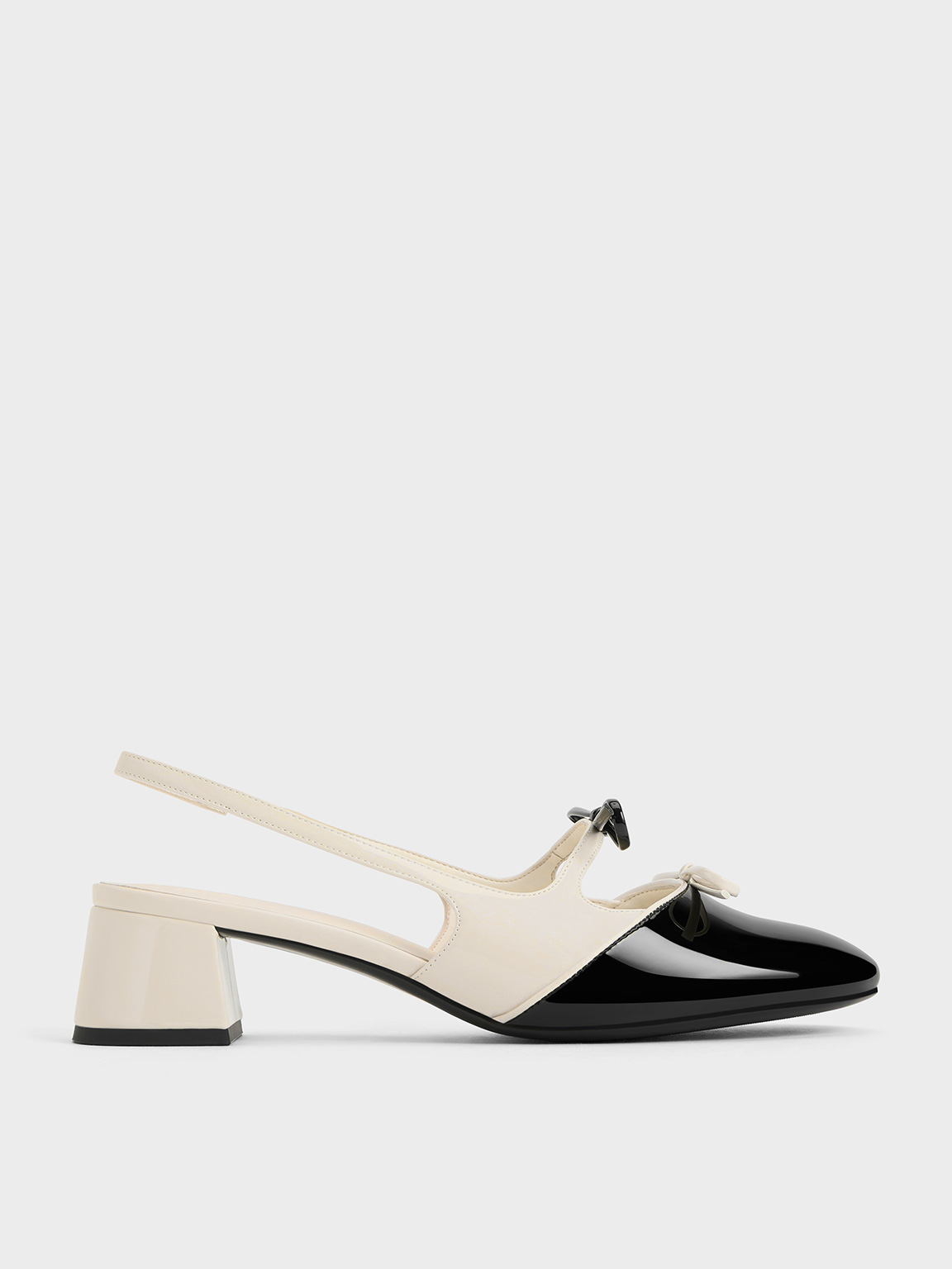 Charles & Keith Dorri Two-tone Double-bow Slingback Pumps In Chalk