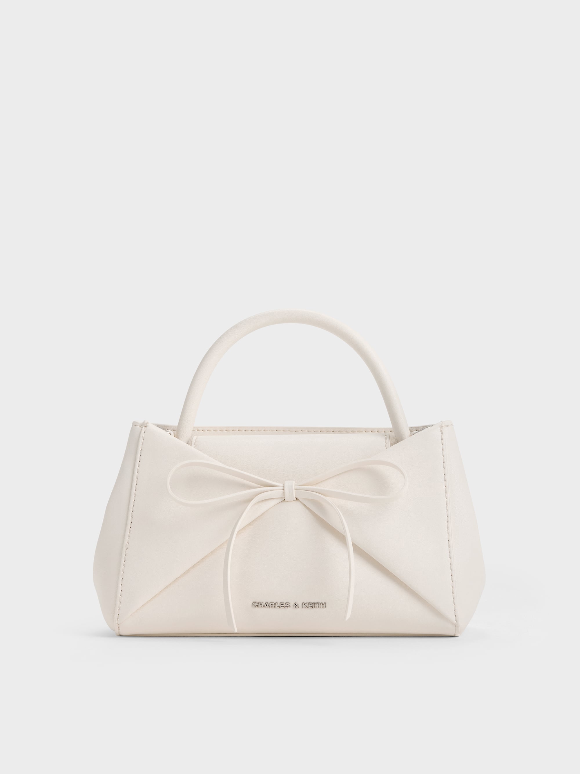 Hazel Bow Panelled Top Handle Bag - Cream - CHARLES & KEITH US