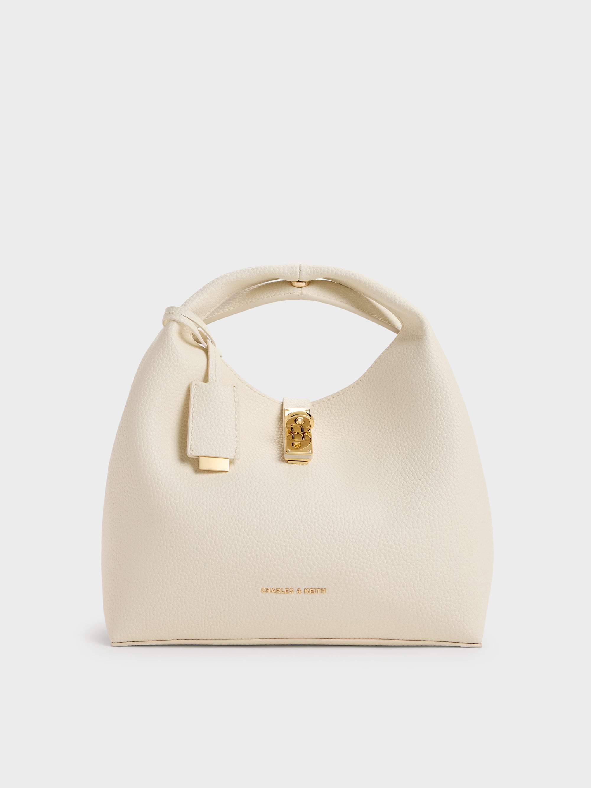 Chance Turn-Lock Bucket Bag - Cream - CHARLES & KEITH US