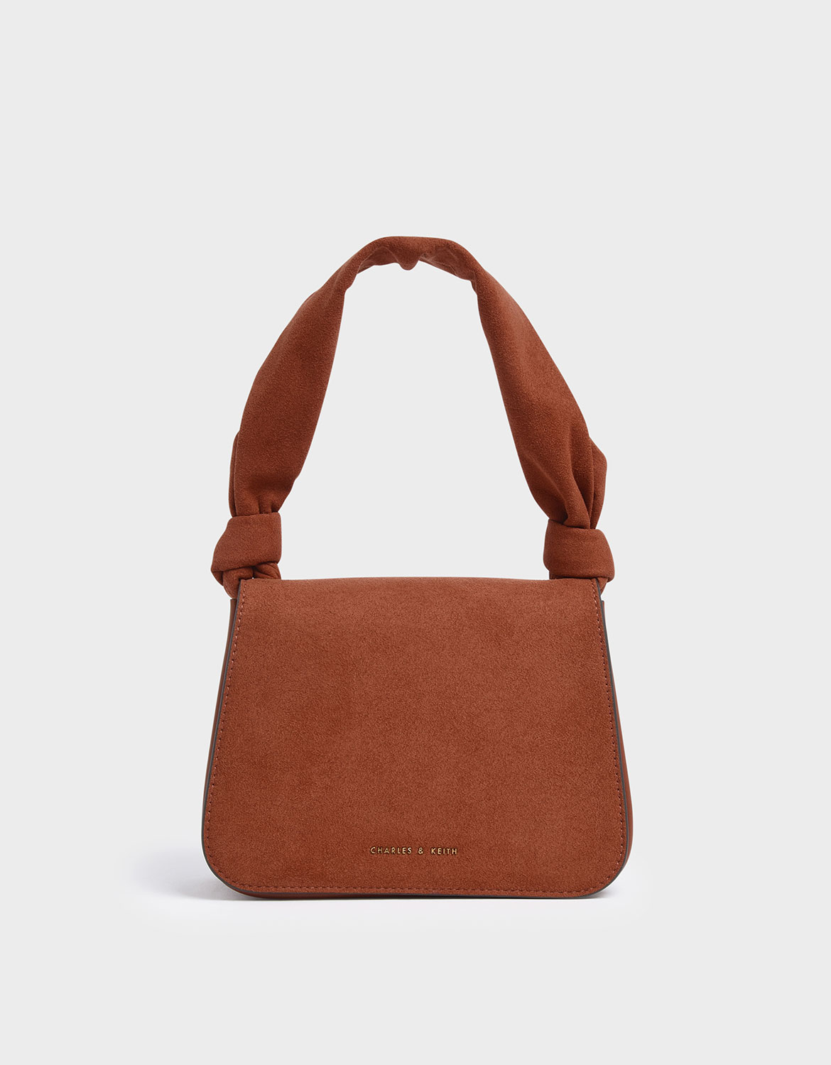 charles and keith knotted strap handbag