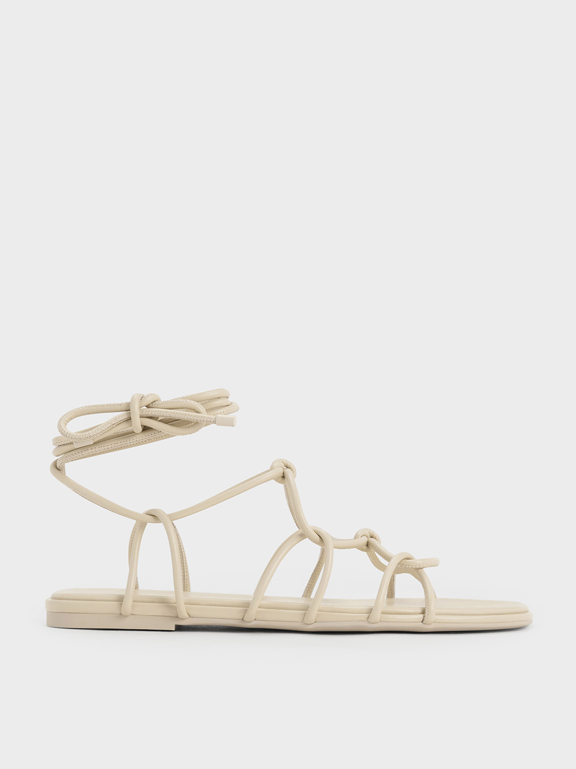 Shop Charles & Keith - Strappy Knotted Tie-around Sandals In Beige