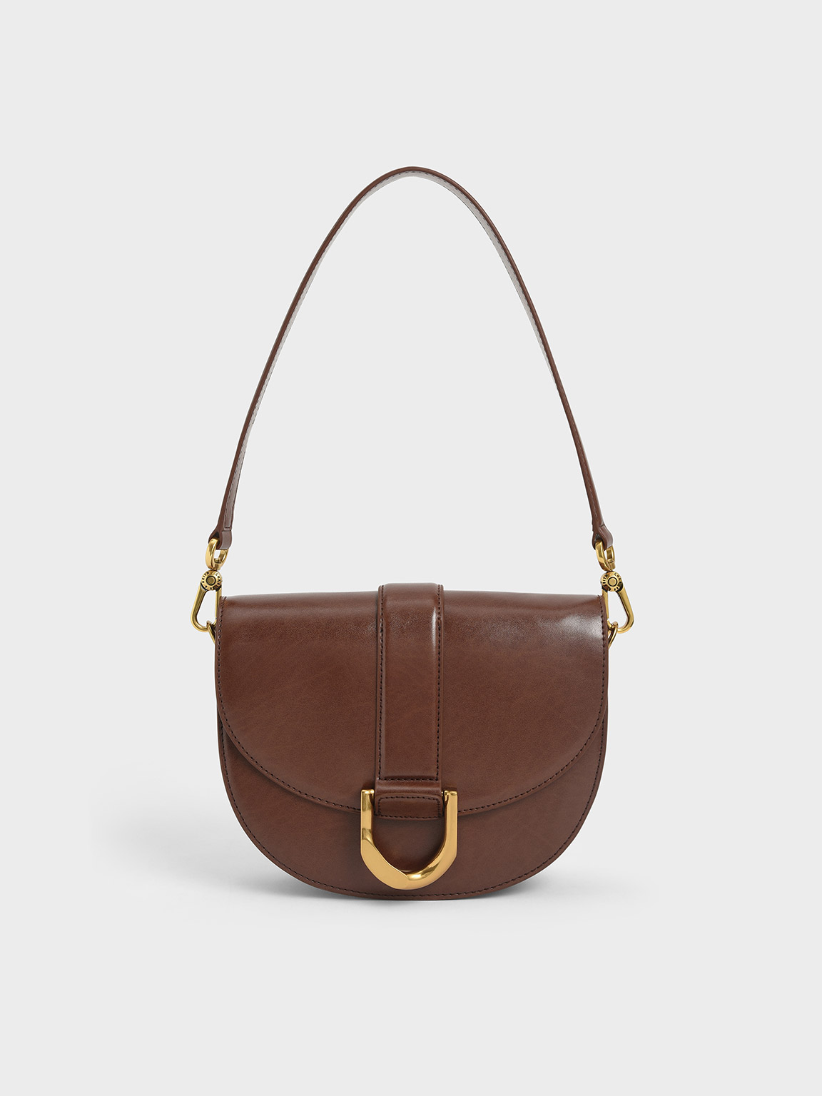 Buy the Calvin Klein Saddle Shoulder Bag Brown