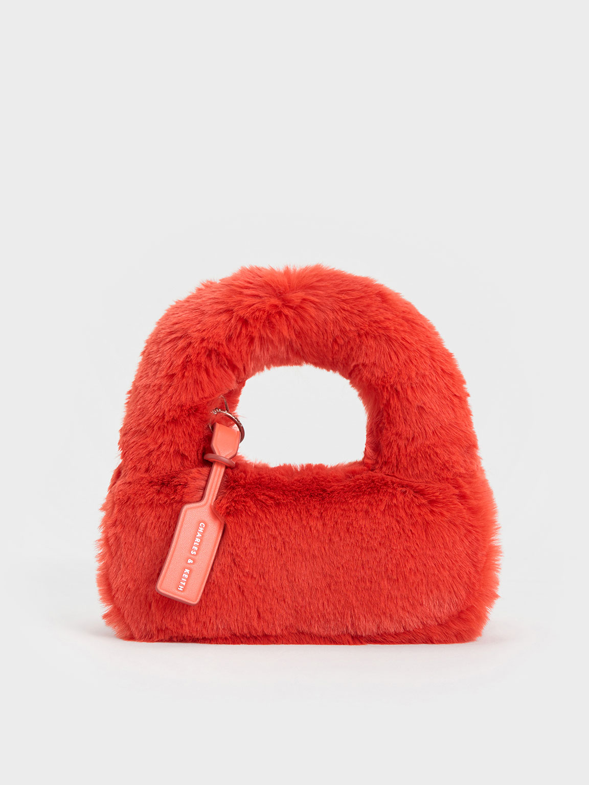 Charles & Keith Mini Yama Furry Top Handle Bag In Orange