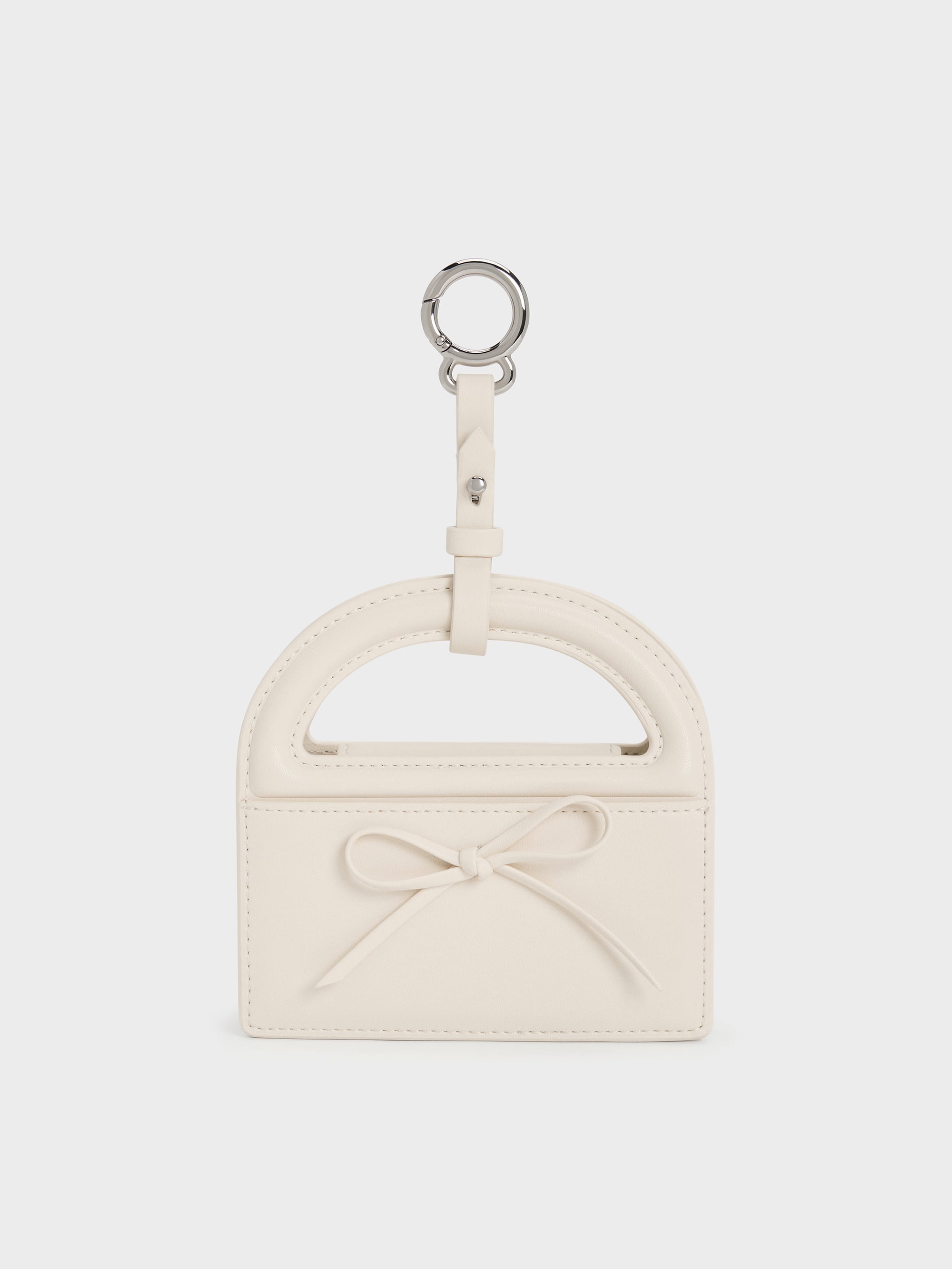 Charles & Keith - Reese Bow Top Handle Wristlet In Cream