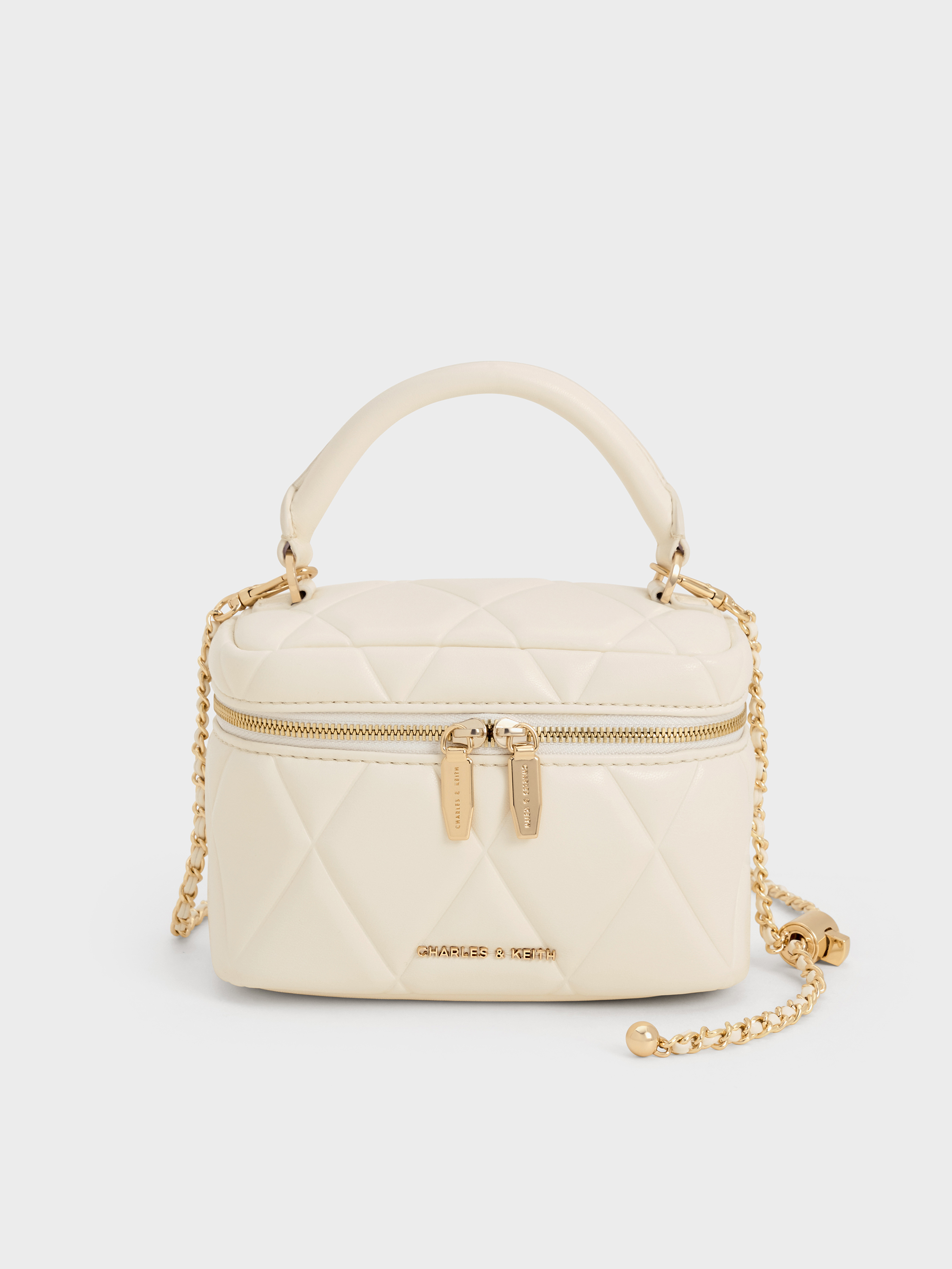 Cream Arwen Quilted Top Handle Vanity Bag - CHARLES & KEITH Cream Arwen Quilted Top Handle Vanity Bag - CHARLES & KEITH