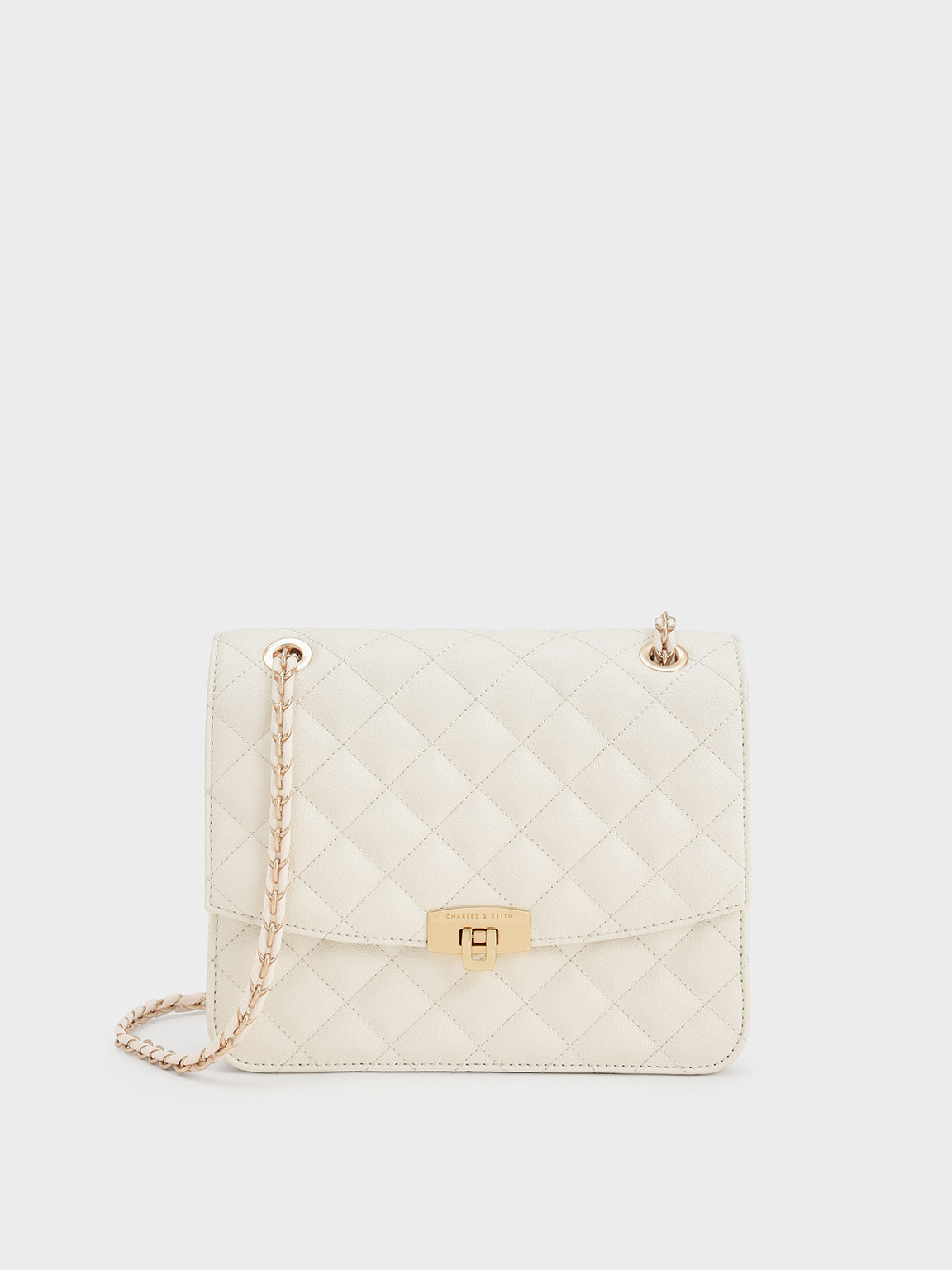 Cream Quilted Push-Lock Clutch Bag - CHARLES & KEITH ZA