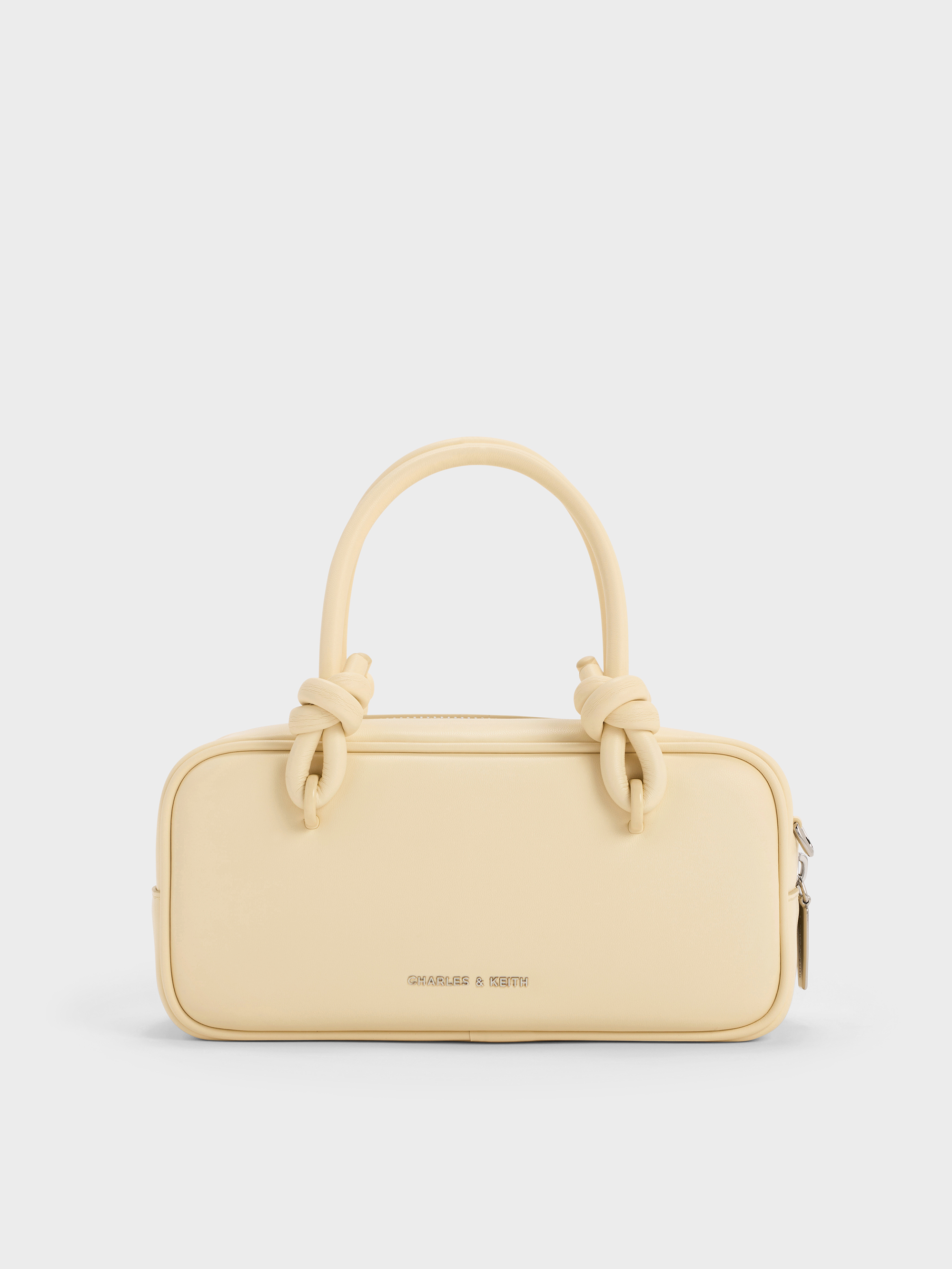 Charles & Keith - Sammie Knotted-handle Elongated Bag In Butter Yellow
