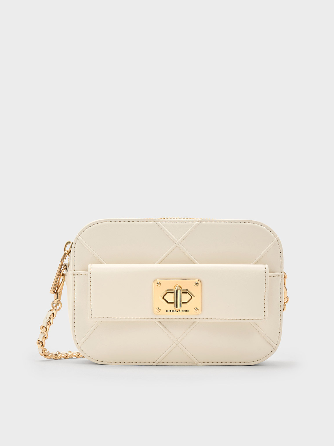 Shop Charles & Keith Eleni Quilted Zip Crossbody Bag In Cream