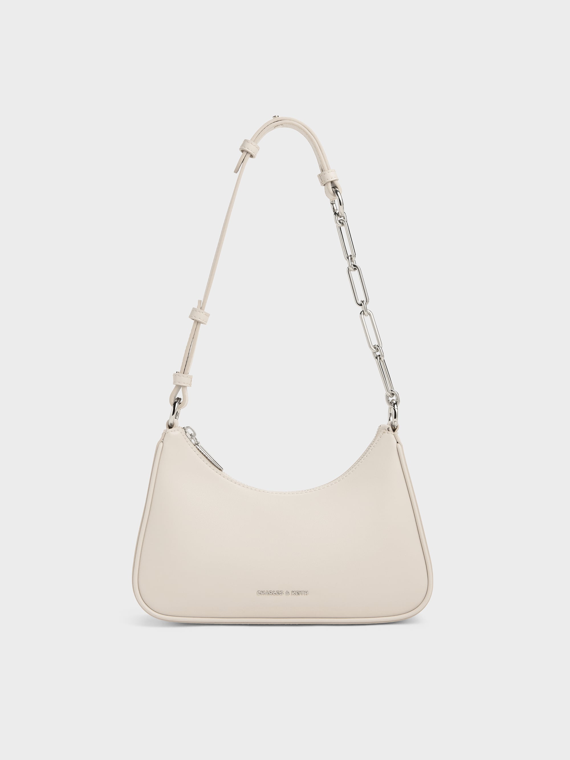 CHARLES & KEITH ホワイトショルダーバッグ Hazel ヘーゼル ボウ イロンゲイティッドトラペーズショルダーバッグ