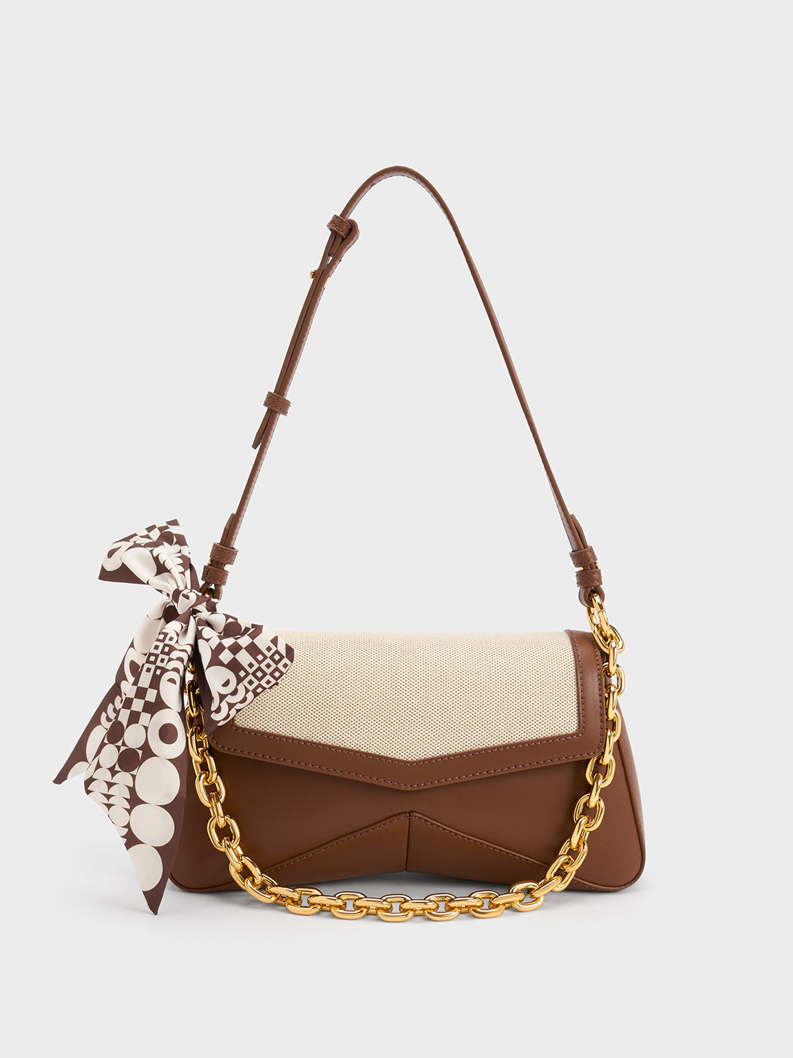 Charles Keith Arley Canvas Chain-link Trapeze Bag In Chocolate