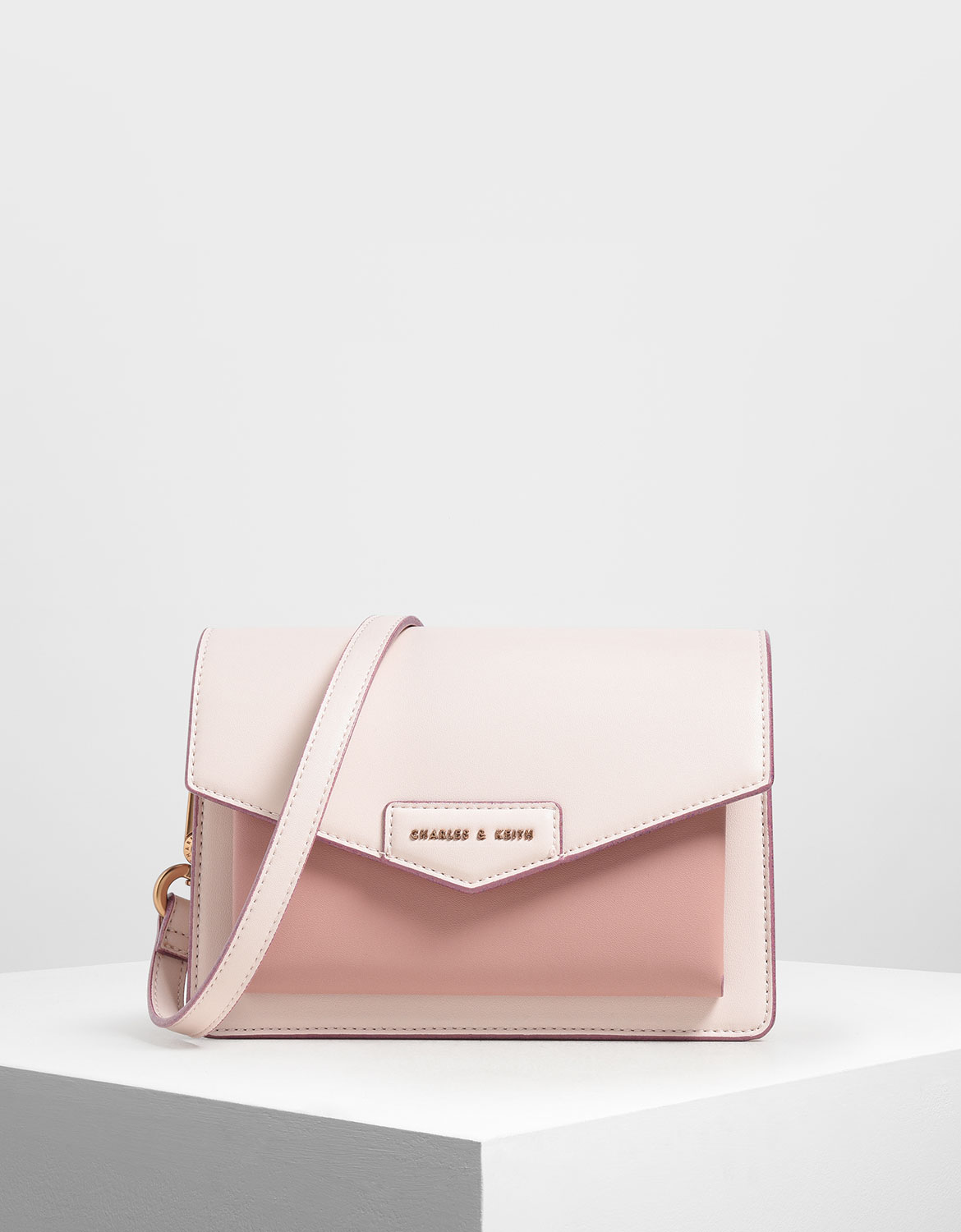 Light Pink Zaina Envelope Crossbody Bag | CHARLES & KEITH