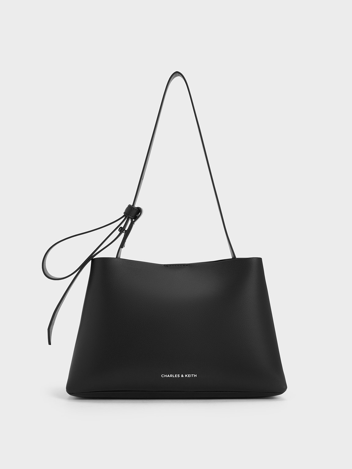Shop Charles & Keith Odella Trapeze Bucket Bag In Noir