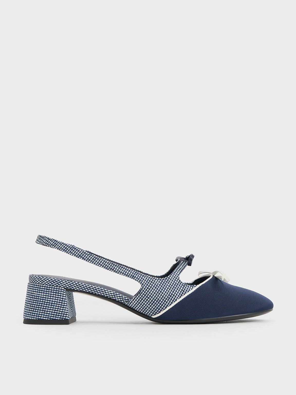 Charles & Keith Dorri Textured Double-bow Slingback Pumps In Dark Blue