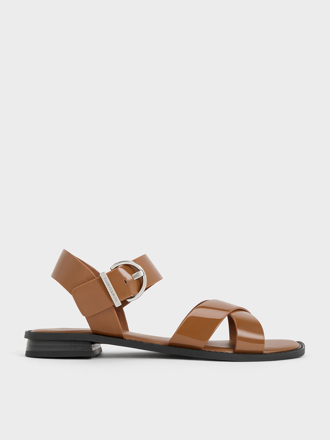 Charles & Keith Patent Crossover Strap Sandals In Cognac