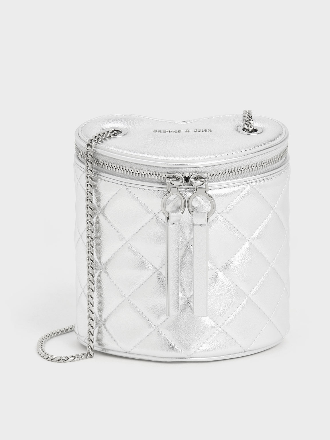 Charles & Keith Philomena Metallic Quilted Heart Cylindrical Bag In Silver