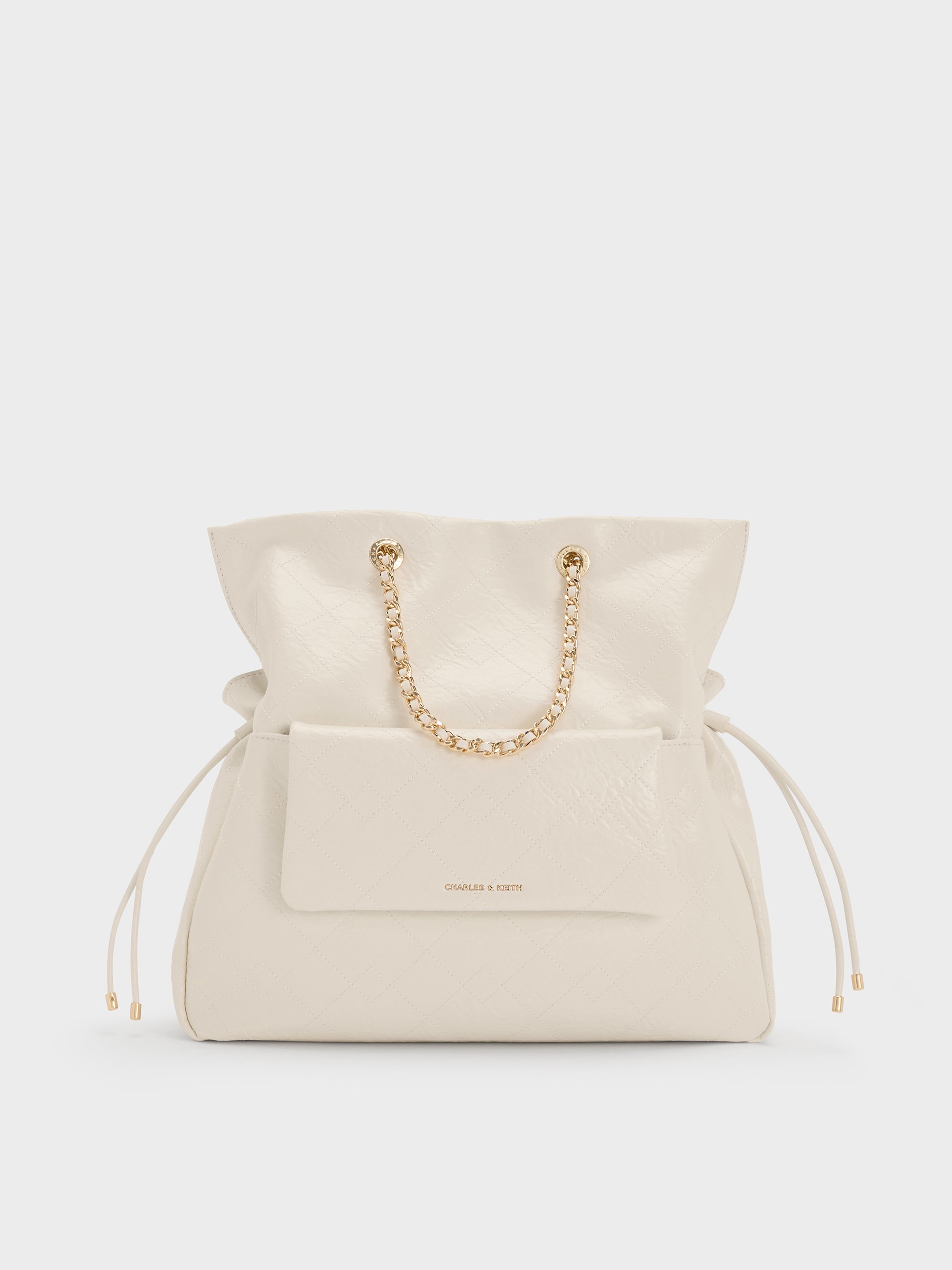 Charles & Keith - Duo Quilted Braided-strap Drawstring Two-way Backpack In White